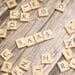 scrabble-letters-spelling-saas-on-a-wooden-tabl