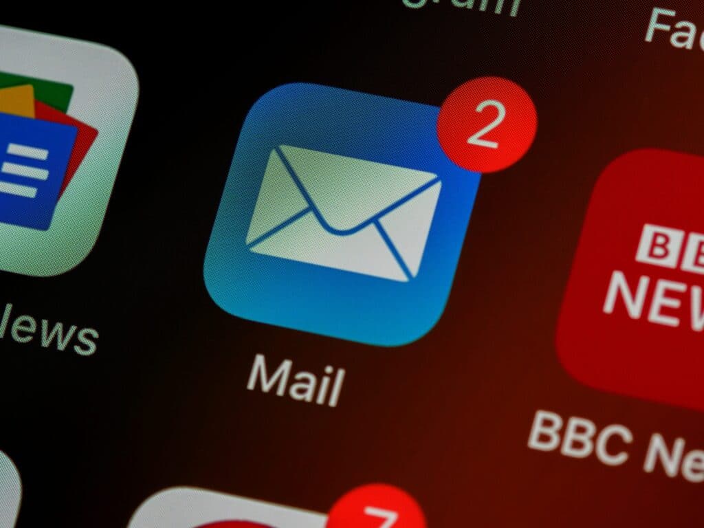 brett-jordan-LPZy4da9aRo-unsplash-scaledjpg » Flux Labs - Managed Information Technology Services closeup of mail app icon on phone