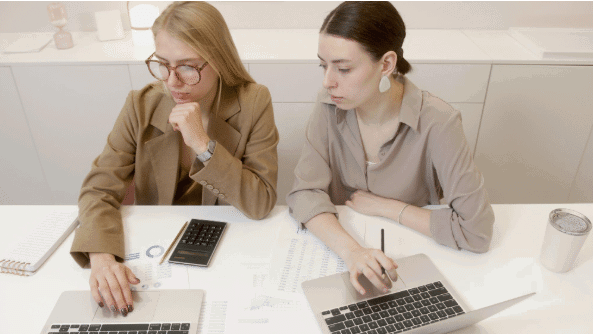 Screenshot-2026-09-02-160247png | Flux Labs two women with laptops